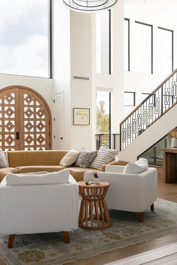 Custom home interior with arched entry door, San Diego, designed by Micah Winkelstein